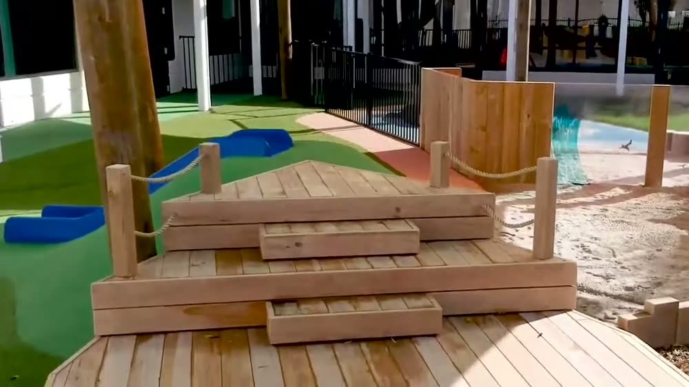 Timber blocks and sand play area in the centre's outdoor space
